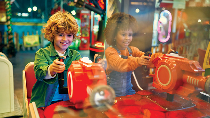 Kids having fun on a carnival Carousel